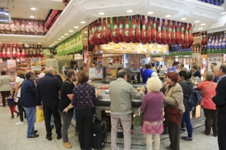 Customers inside a Museo del Jamon chain store shop in Madrid city centre, Spain, Europe