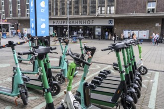 Designated sharing stations, parking space for e-scooters, rental bikes, e-scooters, in front of