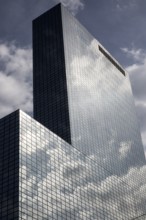 High rise modern glass office block buildings reflecting clouds, Rotterdam, Netherlands