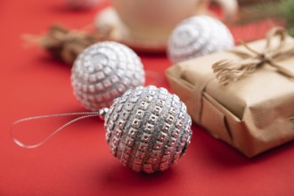 Christmas or New Year composition. Decorations, box, cinnamon, silver balls, fir and spruce