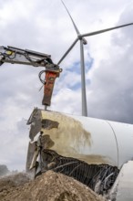 Demolished tower of a 20 year old wind turbine, in the Werl wind farm, 5 old Enercon E-66 turbines