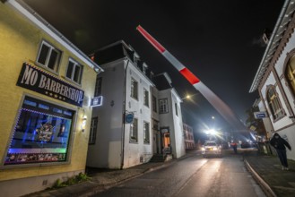 Transport of a 68 metre long, 22 tonne blade of a wind turbine, here in Breckerfeld, with a