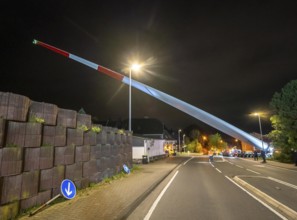 Transport of a 68 metre long, 22 tonne blade of a wind turbine, here in Schwelm, with a