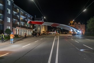 Transport of a 68 metre long, 22 tonne blade of a wind turbine, here in Schwelm, with a