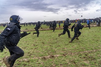 Violent clashes between thousands of demonstrators and the police, after a demonstration against