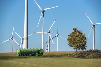 Wind farm near Lichtenau, wind turbines, country road, Driburger Straße, cattle feed transporter,