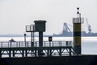 Weser estuary near Bremerhaven, view over the pier of the Freilaufkanal, across the Weser to the