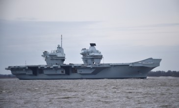 Aircraft carrier HMS Queen Elizabeth on the Elbe between Hamburg and the North Sea,