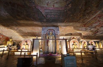 Buddha statues and ceiling fresco in the Dambulla cave temple, Dambulla, Central Province, Sri