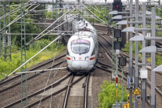 ICE train travelling on open track near Gesundbrunnen station, Berlin, Germany, Europe