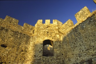 Scan, interior, corner tower, battlements, dark blue cloudless sky, Frangokastello, Venetian