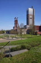 Zeche Zollverein winding tower and children's playground in Nordsternpark, Gelsenkirchen, Ruhr