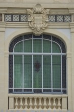 Window with decorations on Villa Caisse d'Epargne, stained glass window, parapet,