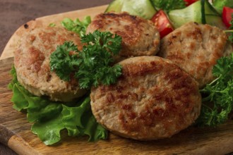 Fried cutlets, turkey, with vegetable salad, top view, no people