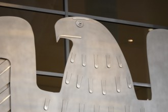 Federal eagle in the plenary of the German Bundestag in Berlin in the evening light, 14/03/2024