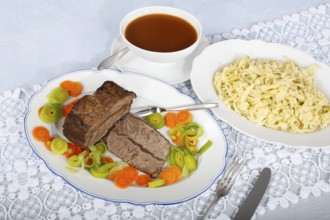 Swabian cuisine, roast beef, roast ox, herb spaetzle, meat dish, gravy, carrot vegetables, leek,