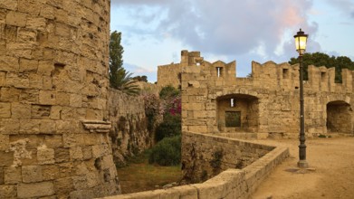 City wall, Eleftherias Tor tor, Medieval fortress with high stone walls and lanterns, surrounded by