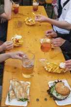 Food and drinks on a beer table at a folk festival, Bavaria, Germany, Europe