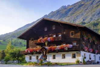 Farmhouse with floral decorations, Prägarten am Großvenediger, Virgental, East Tyrol, Tyrol,