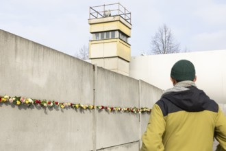 The Wall decorated with roses at the central commemorative event at the Berlin Wall Memorial to