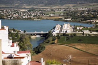 Reservoir lake occupying flooded valley land, village of Arcos de la Frontera, Cadiz province,