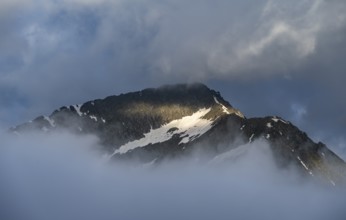 Rocky mountain peak Hochsteller in dramatic morning light, Berliner Höhenweg, Zillertal Alps,