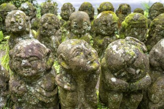 Moss-covered stone statues of rakans, the disciples of Buddha, Otagi Nenbutsu-ji temple, Kyoto,