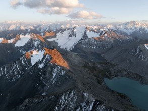 Evening mood, mountain panorama, aerial view, 4000 metre peak with glacier, mountain pass and