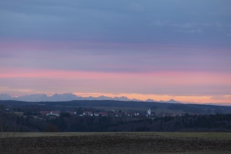 Alpine panorama near Magolsheim. Säntis, Swiss Alps at sunset with a view of Mehrstetten. View from