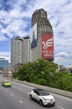 Sathorn Unique Tower with iphone advert, Bangkok, Thailand, Asia