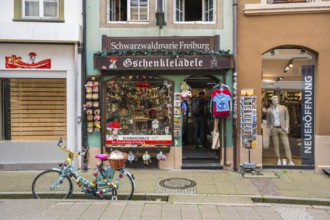 Traditional souvenir shop with items from the Black Forest in the historic city centre of Freiburg