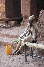 Rock churches of Lalibela, pilgrims in front of the entrance to Bete Maskal, Chapel of the Cross,