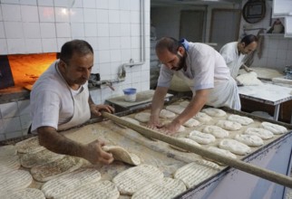 Bakers making bread dough, Barbol, Iran, 18/05/2016, Asia