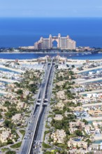 The Palm Jumeirah with Atlantis Hotel artificial island from above in Dubai, United Arab Emirates,