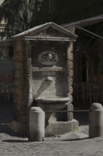 Public drinking water fountain in the historic centre of Rome, Italy, Europe