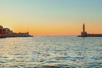 Venetian lighthouse at sunset, Chania, Crete, Greek Islands, Greece, Europe