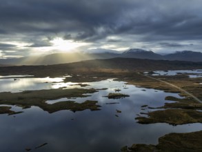 Morning light, cloudy mood, sunbeams, loch, moor, mountain landscape, aerial view, road, autumn,