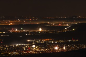 New Year's Eve fireworks 2023 at Breitenstein near Ochsenwang. View from the Swabian Alb to