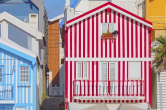 Brightly painted beach homes, Costa Nova do Prado, Aveiro, Portugal, Europe