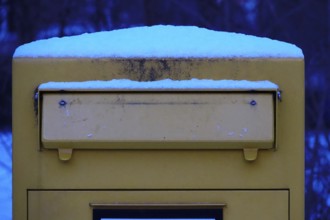 Snow-covered post box in winter, Germany, Europe