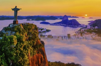 Corcovado 710m with Christ the Redeemer statue above Botafogo Bay with Sugar Loaf 396m at sunrise