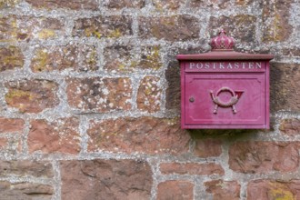 Mailbox on a red sandstone wall, Rhineland-Palatinate, Germany, Europe