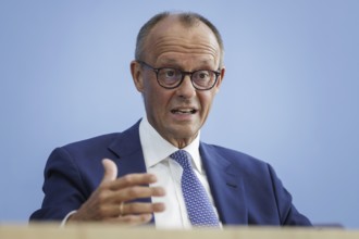 Friedrich Merz, CDU party chairman, at the Federal Press Conference on the consequences of Solingen