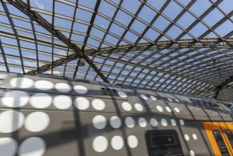 Local train and glass roof at Cologne Central Station, Cologne, Rhineland, North Rhine-Westphalia,