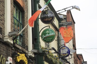 Beer signs outside The Old Mill pub in Temple Bar area, Dublin city centre, Ireland, Republic of