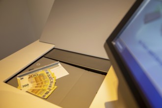 Euro banknotes in a safe deposit box