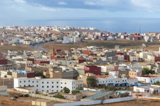 Oblique view over coastal town to Atlantic Ocean, Mirleft, southern Morocco, North Africa