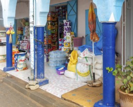 Historic buildings shop in arcaded shopping street in town centre, Mirleft, southern Morocco, North