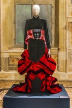 Sculpture in black viscose velvet and folded red taffeta with fibreglass mask, wrapped in silk