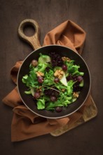 Fresh salad, waldorf, celery stalk, with apple and walnut, grapes, herbs, homemade, no people